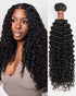 Woman with Jerry Curly Next to A Bundle of Black Hair Extensions